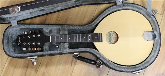 An Ozark Army and Navy style mandolin, cased